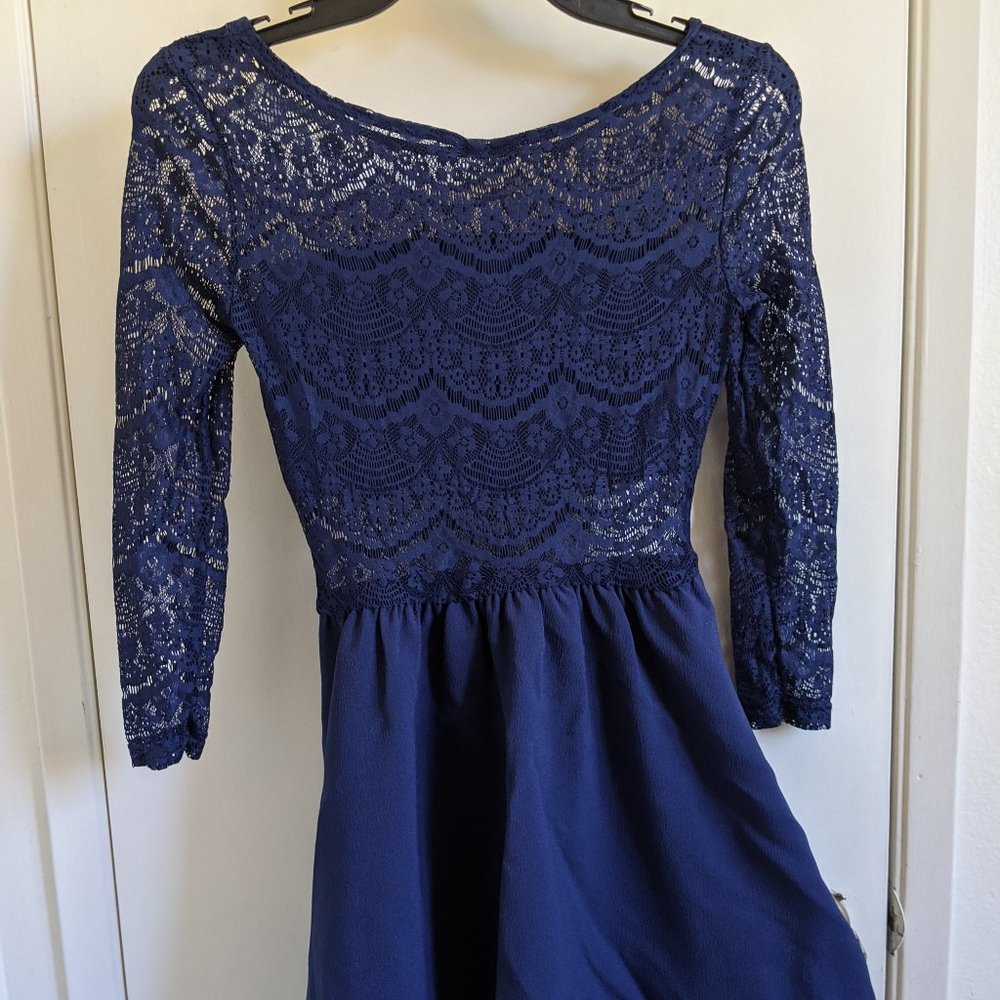 Blue lace mini-dress with see-through laced back